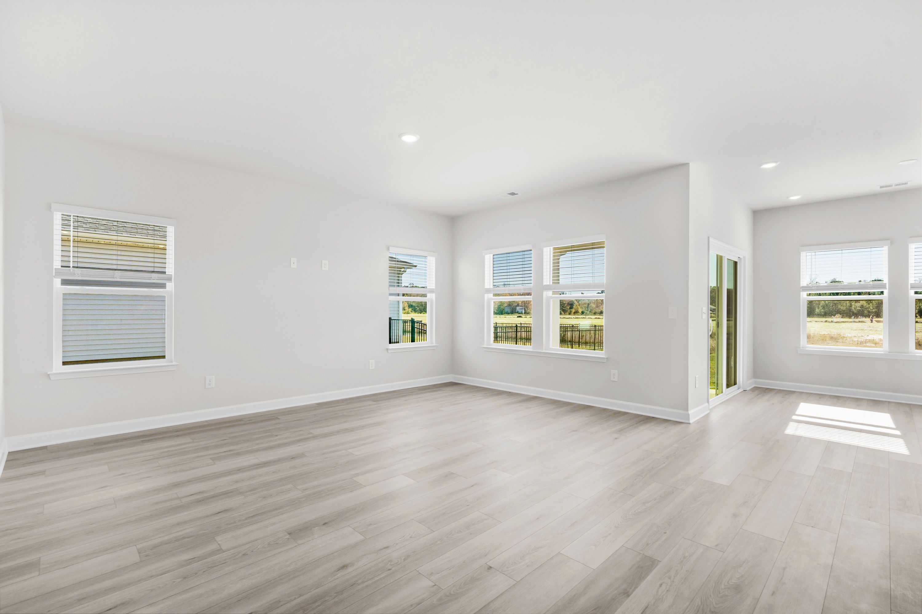 The open-concept living space is accentuated with plenty of natural light.