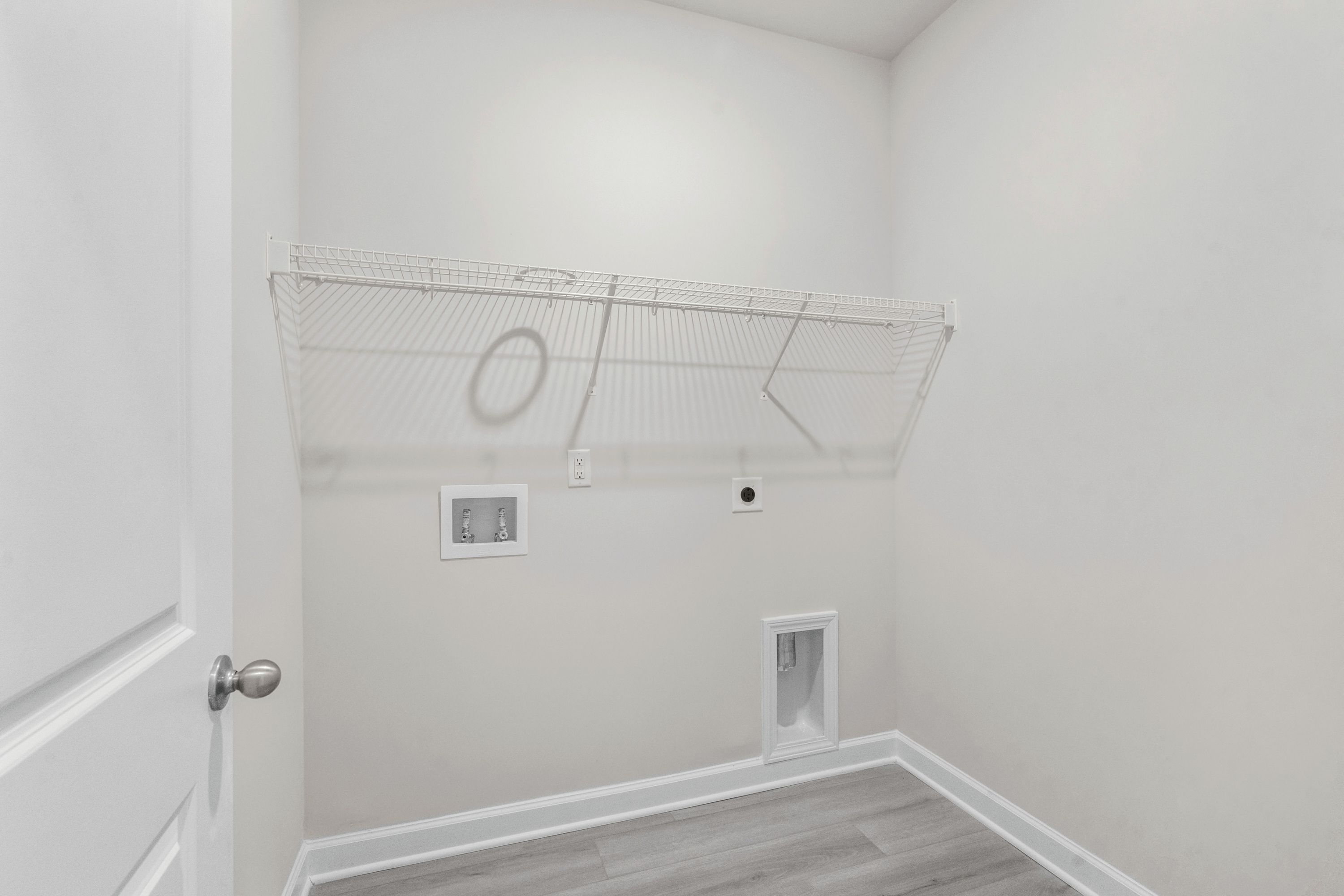 A separate laundry room makes doing chores a breeze.