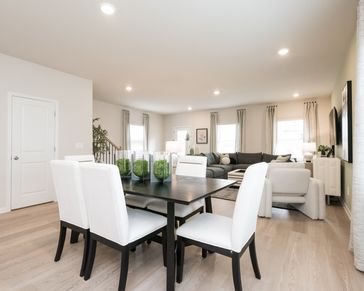 Dining Room in the Cromwell floorplan modeled at a Meritage Homes community in Atlanta, GA.
