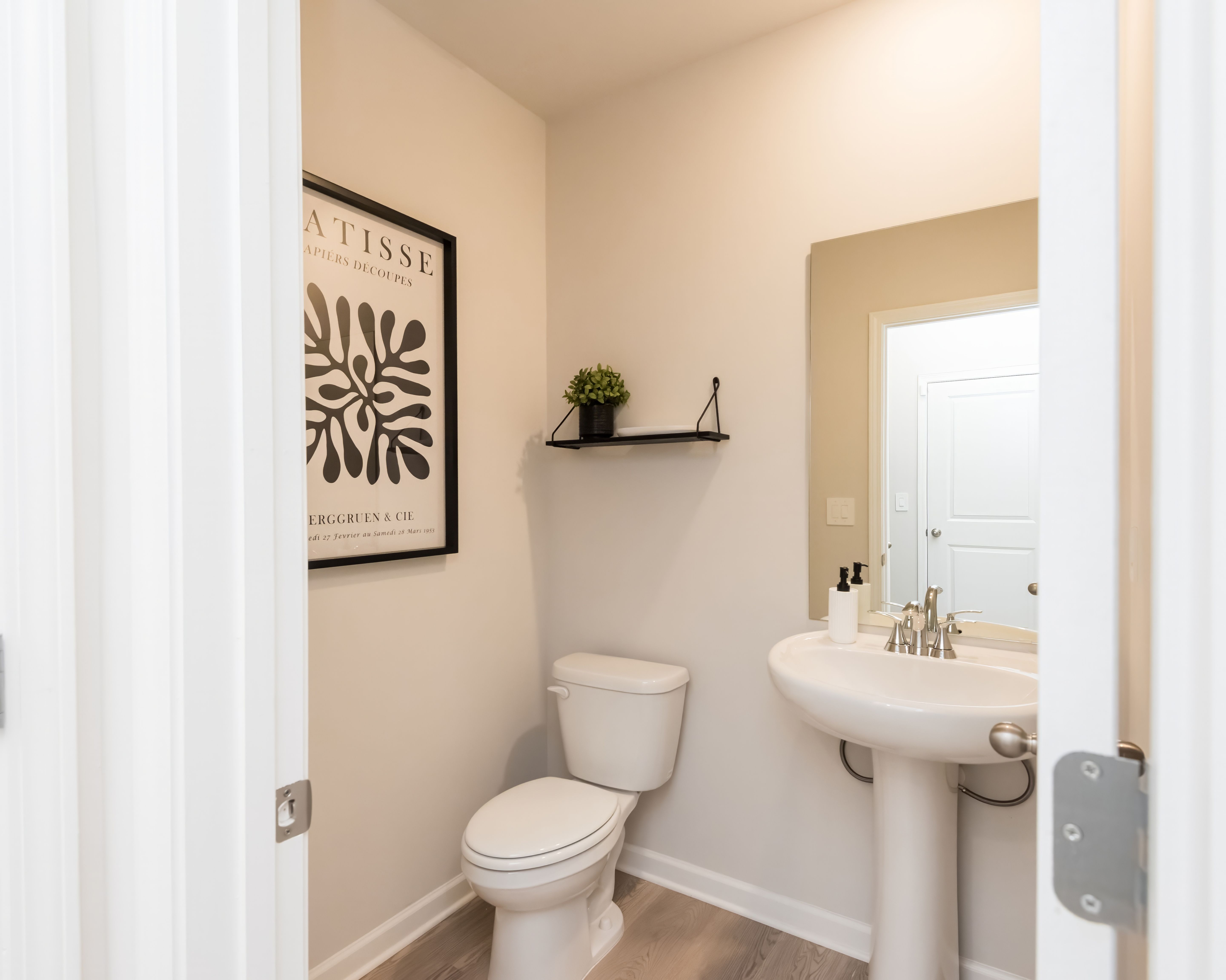 Half Bathroom in the Cromwell floorplan modeled at a Meritage Homes community in Atlanta, GA.