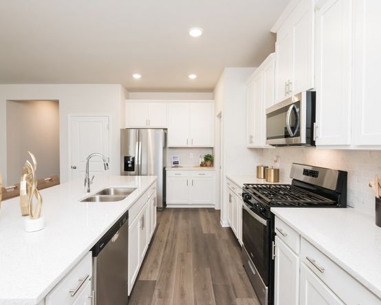 The large kitchen counter gives you ample space to prep dinner.