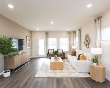 Host a movie night or trivia with friends and family in the spacious living room.