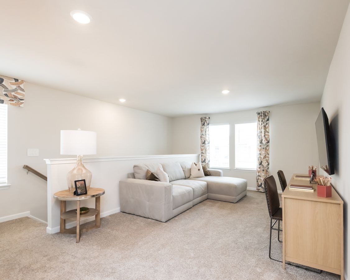 The upstairs loft can easily by transformed into a play room or home theater.
