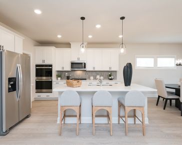 This large kitchen island is perfect for meal prep, casual bites, or catching up over coffee.