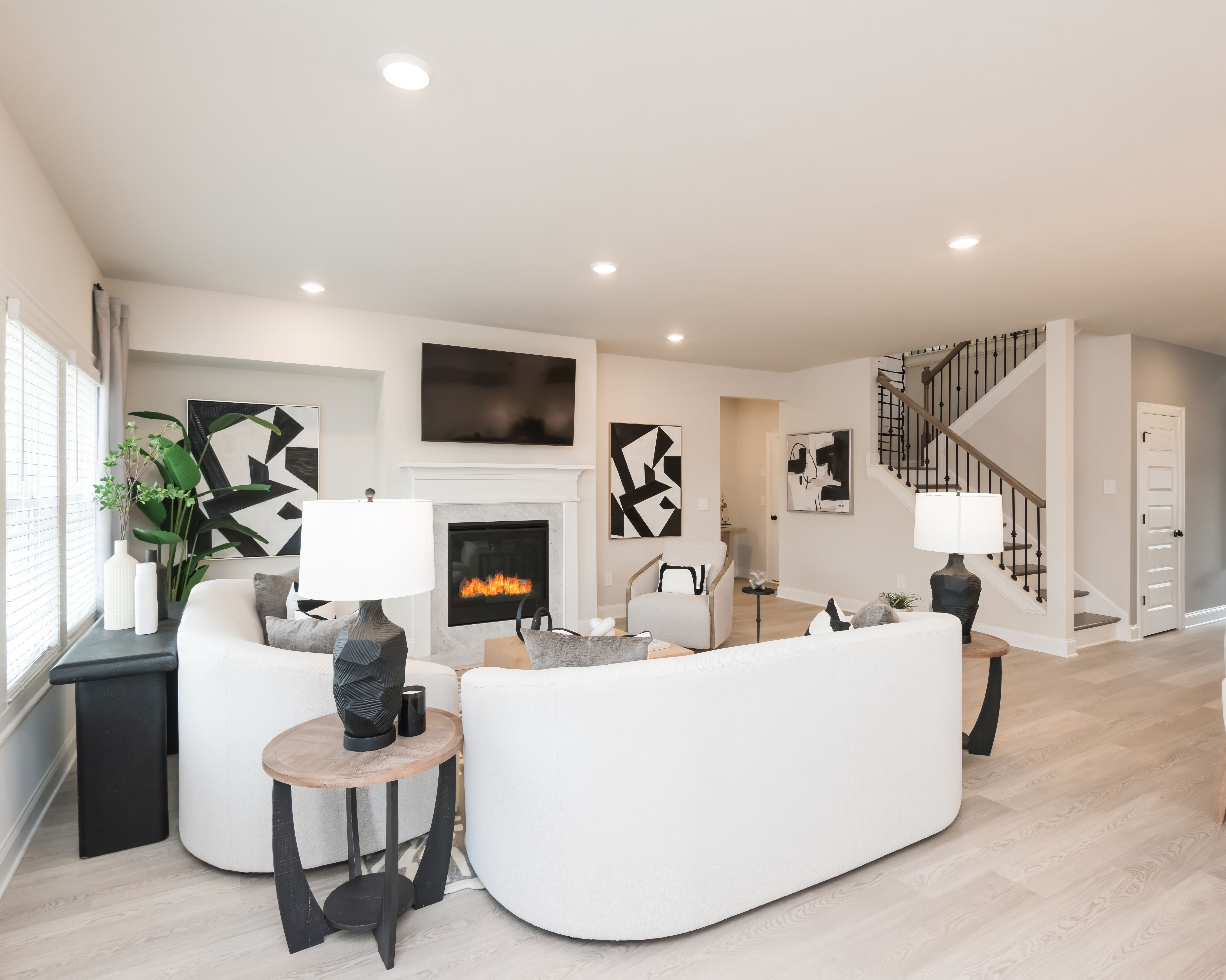 The kitchen and dining room overlook into the living room.