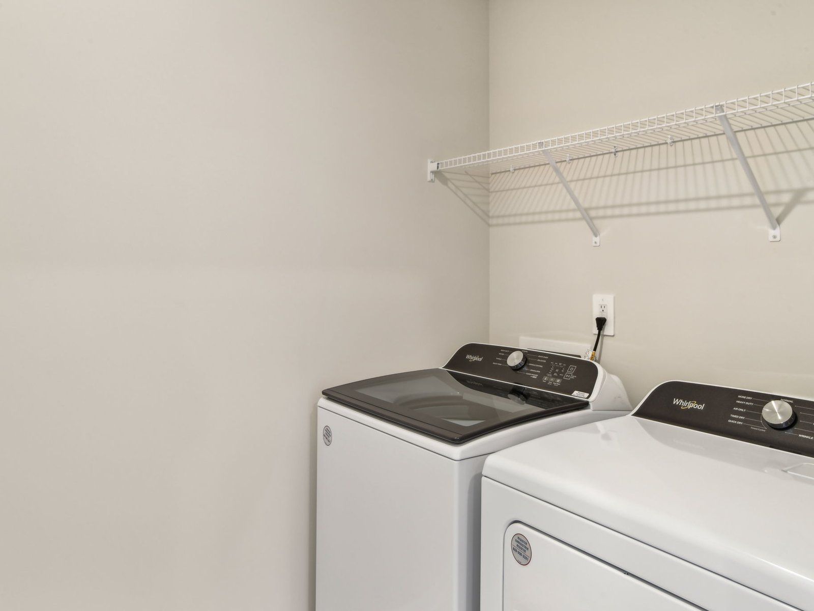 Laundry day just got easier with storage and space to sort and fold your clothes.