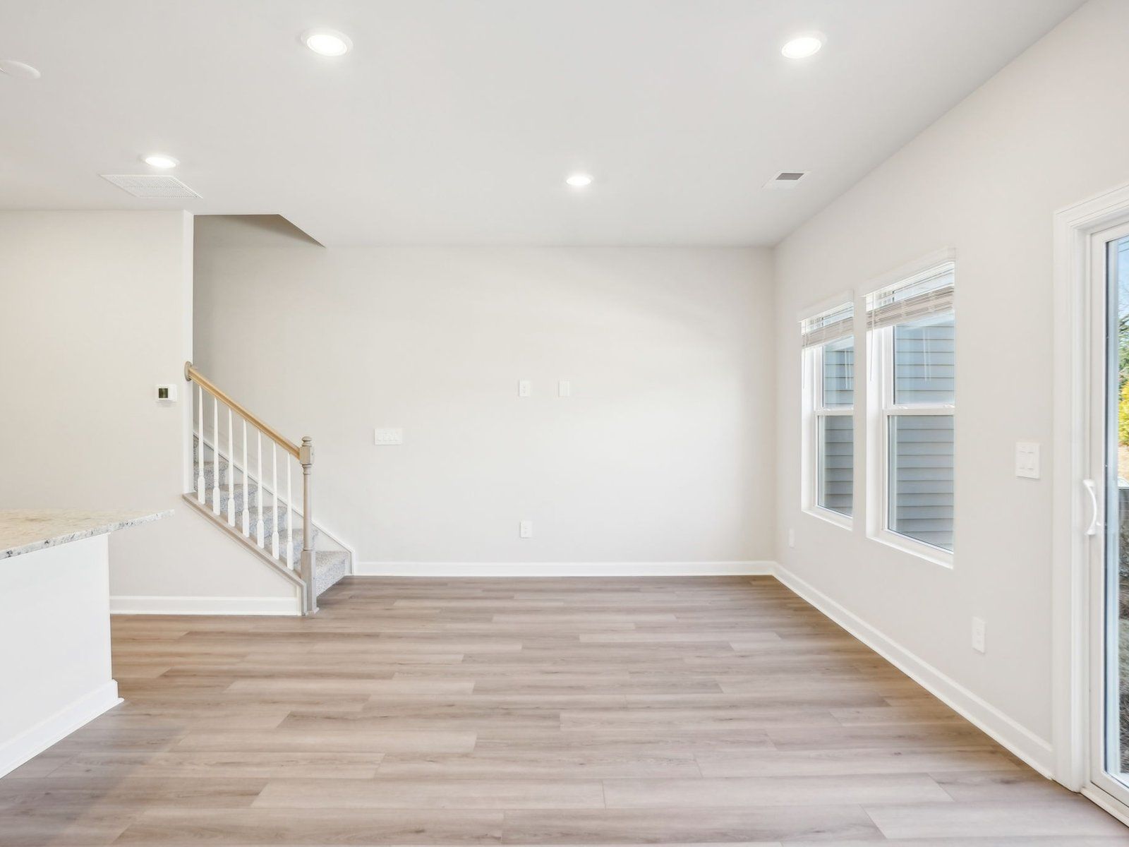 The great room offers an abundance of natural light.