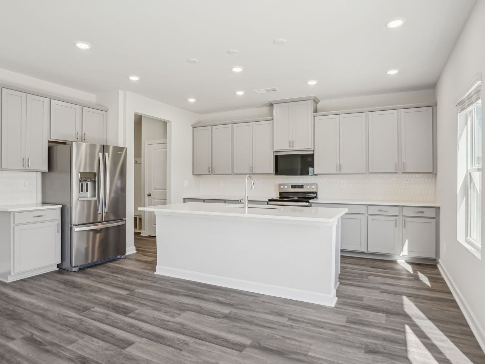 Cook your favorite meal in the sleek, modern kitchen.