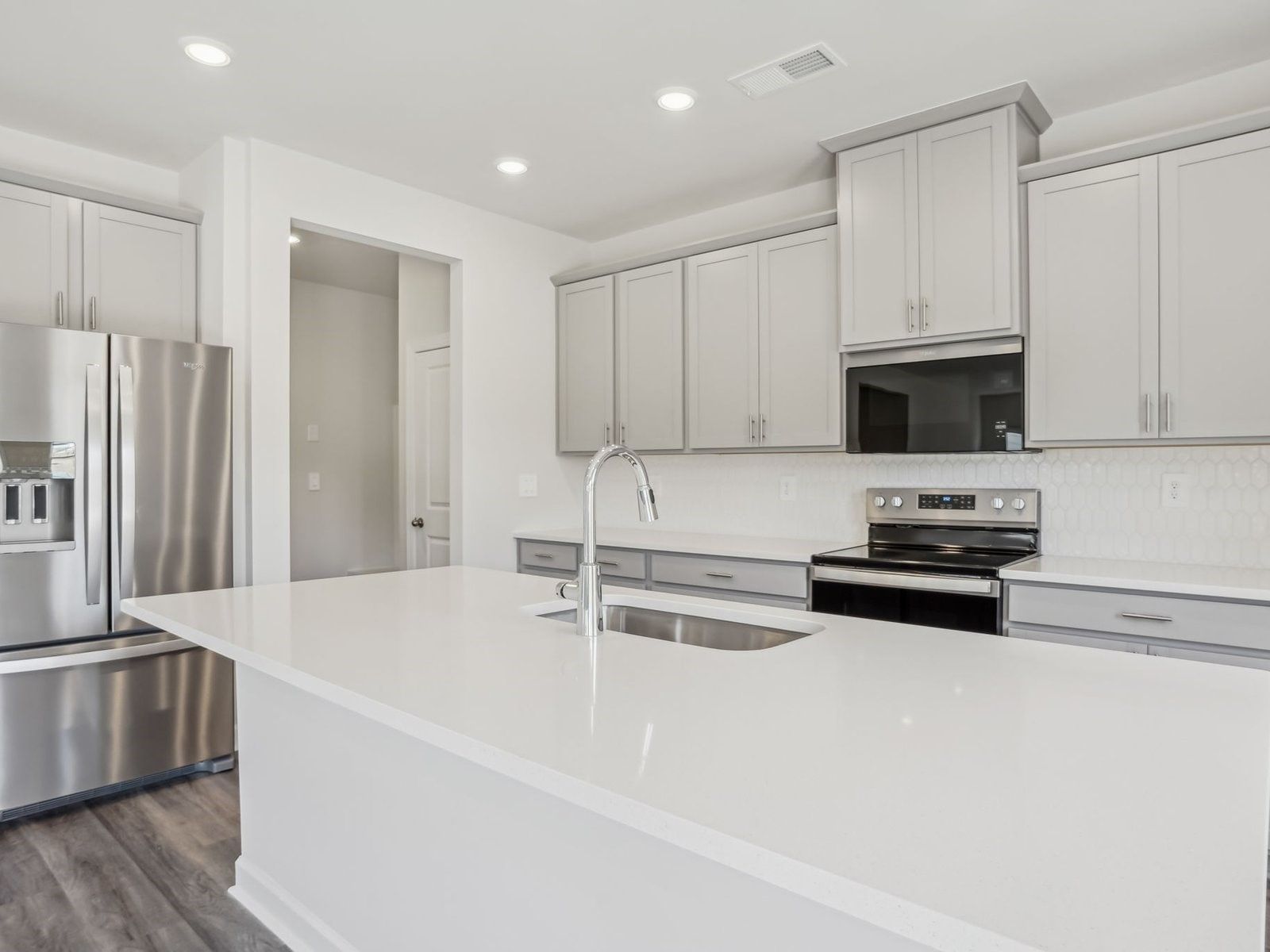 The spacious kitchen will store all your cooking essentials.