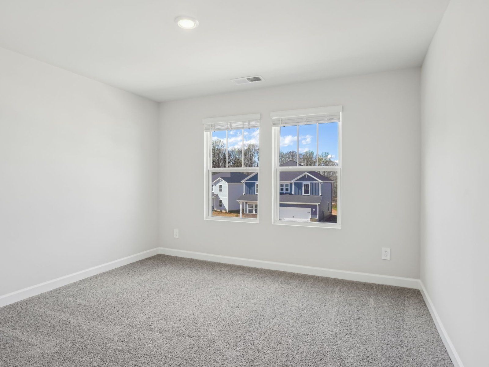 This secondary bedroom provides great natural light.