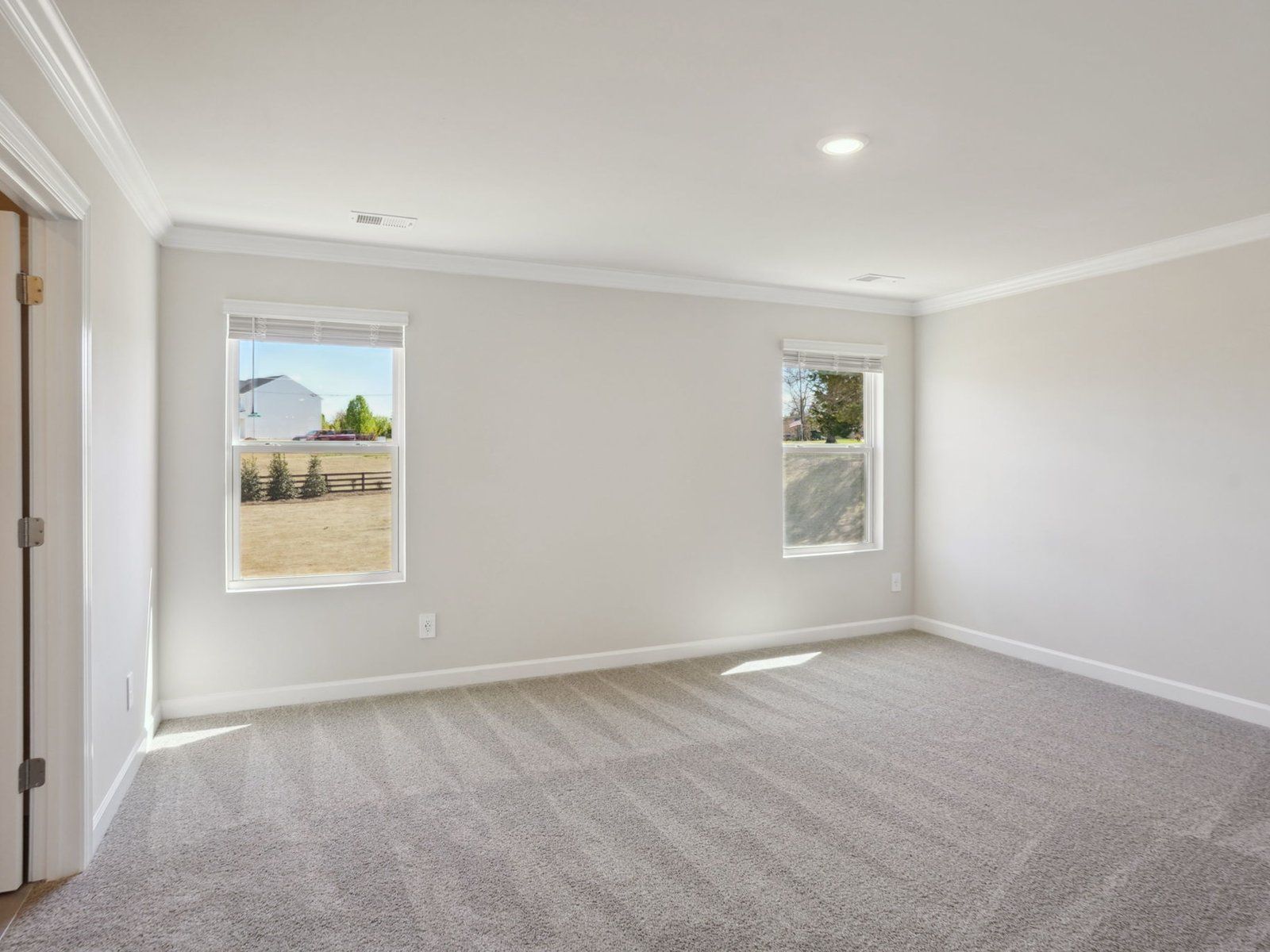 The primary bedroom can become your favorite getaway for rest and relaxation.