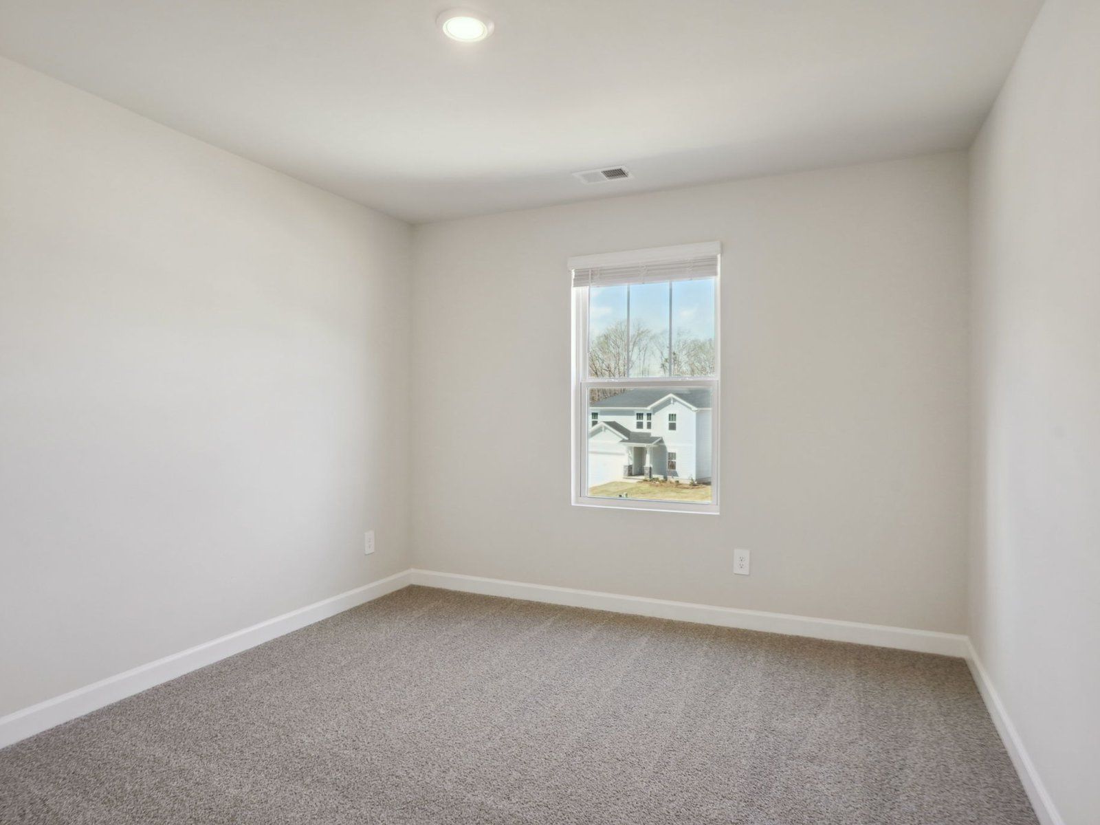 Turn the secondary bedroom into a relaxing guest room.