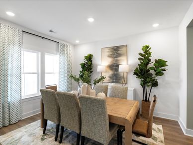 The downstairs flex room off of the foyer makes a great dining room.