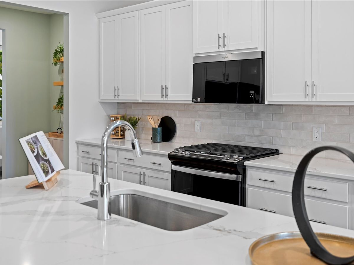 Designer curated finishes and plenty of counter space to meal prep.