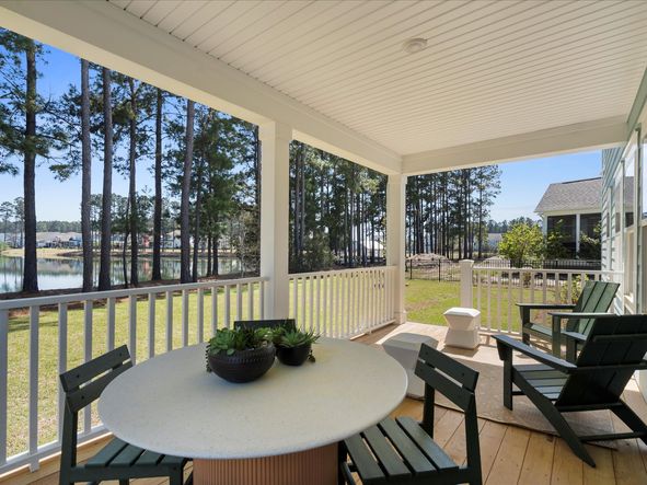 A covered rear deck is a great spot for relaxing outdoors.
