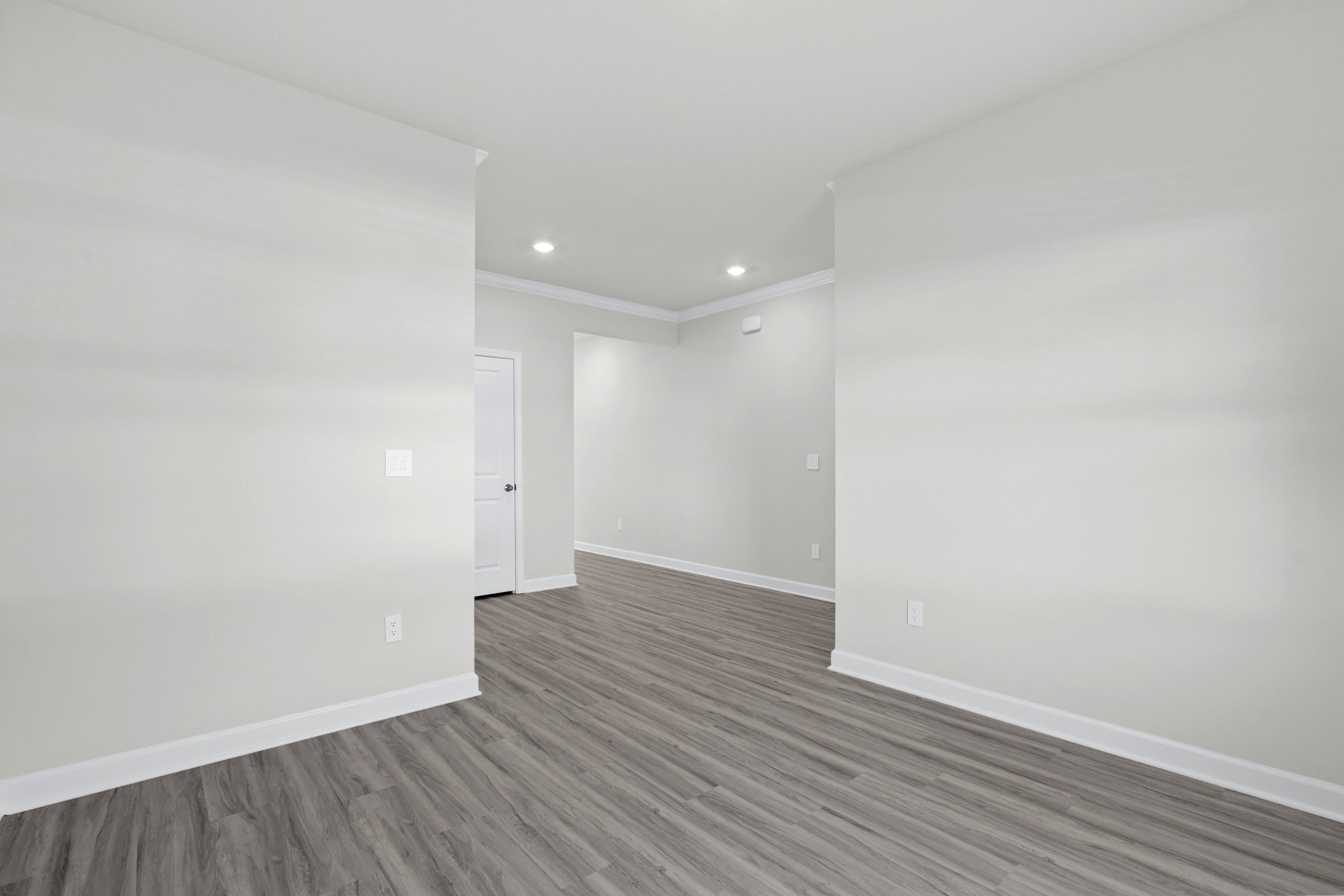 The foyer opens up to a flex space or home office.