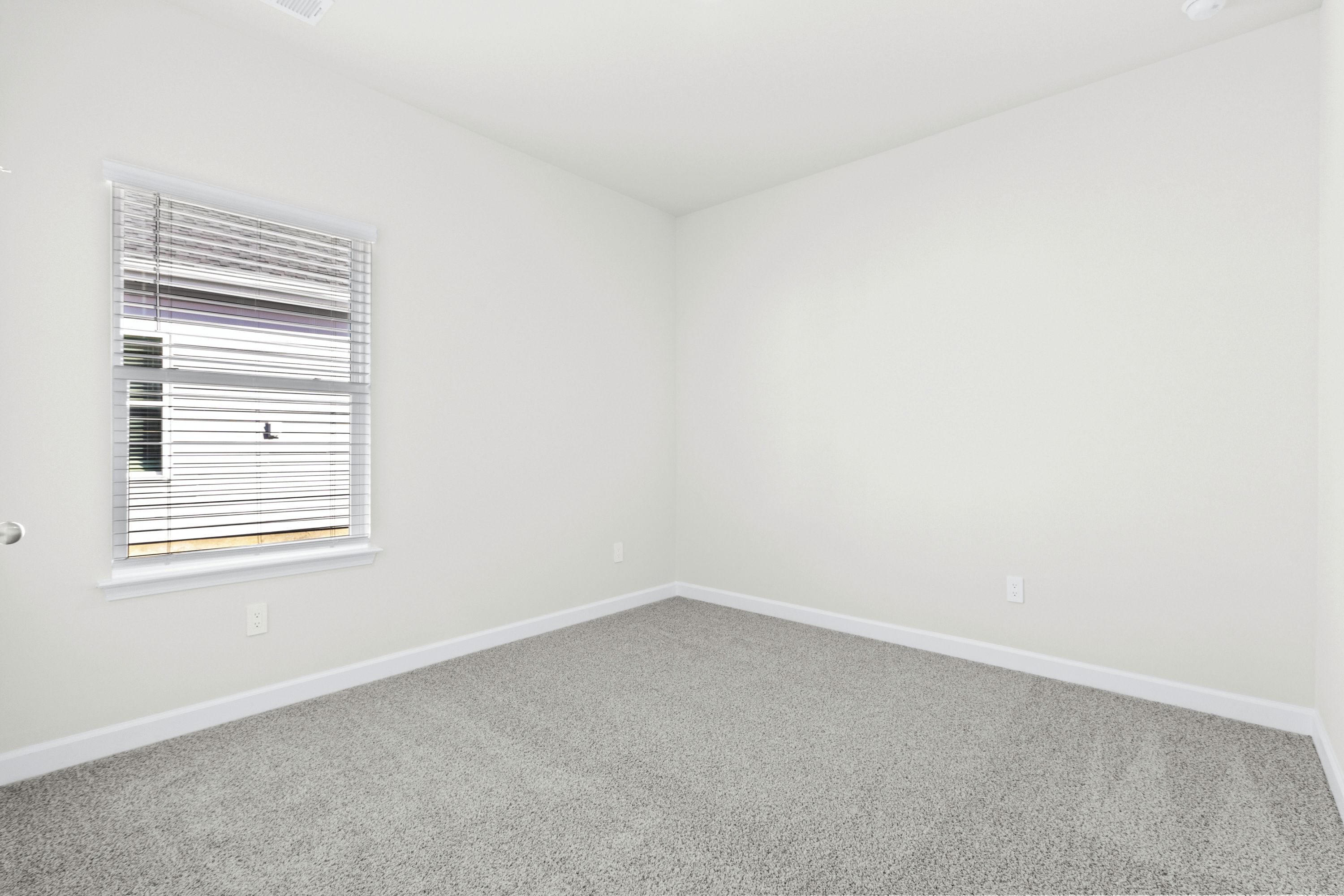 Spacious secondary bedrooms offer plenty of room for the whole family and overnight guests.