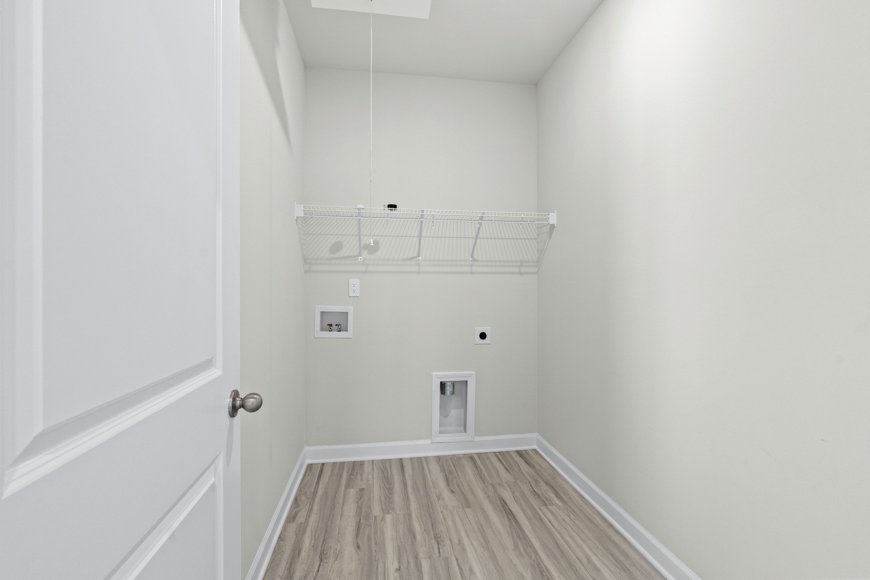 A separate laundry room makes doing chores a breeze.