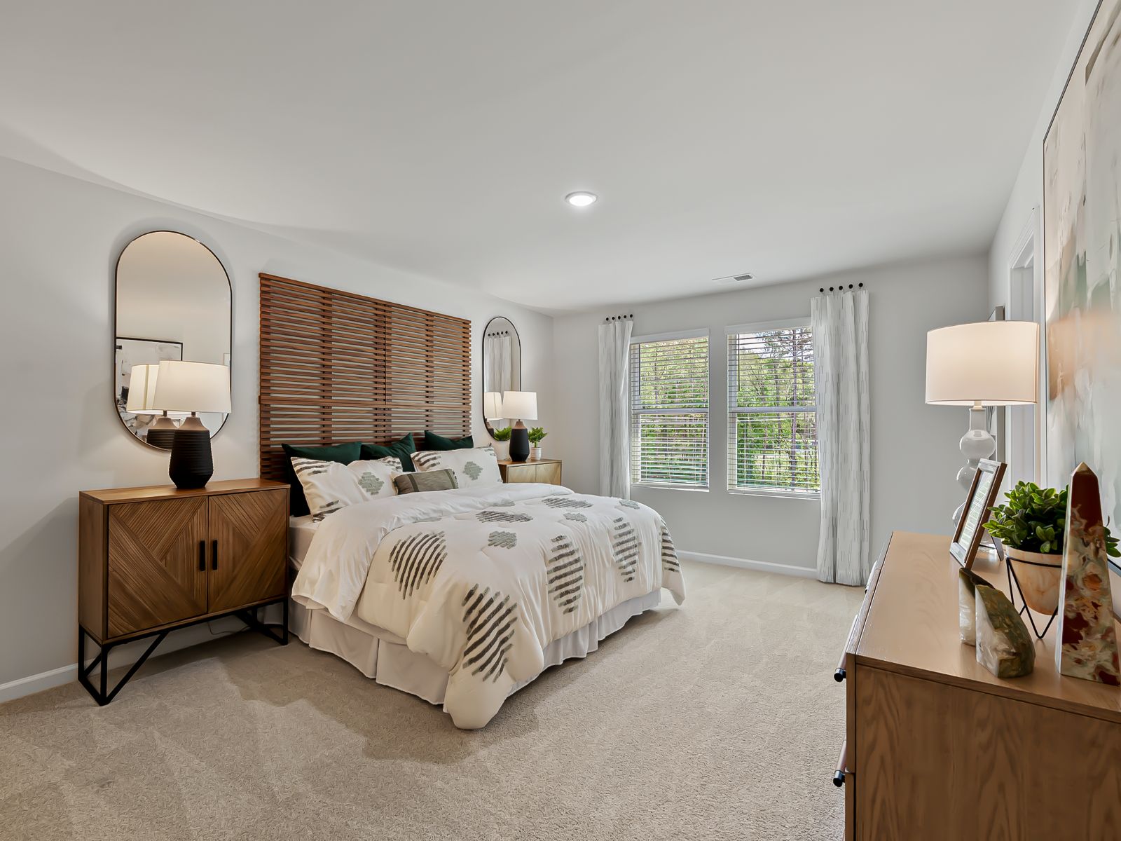 Primary bedroom in the Chatham floorplan at a Meritage Homes community in Zebulon, NC.