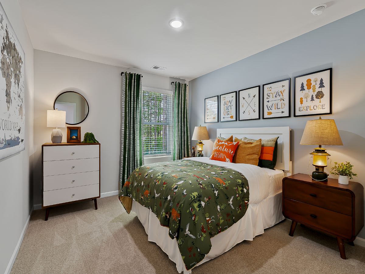 Secondary bedroom in the Chatham floorplan at a Meritage Homes community in Zebulon, NC.