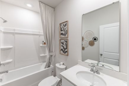 The Gibson floorplan features two secondary bathrooms.