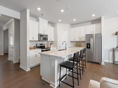 Fill the oversized kitchen island with appetizers for hosting.