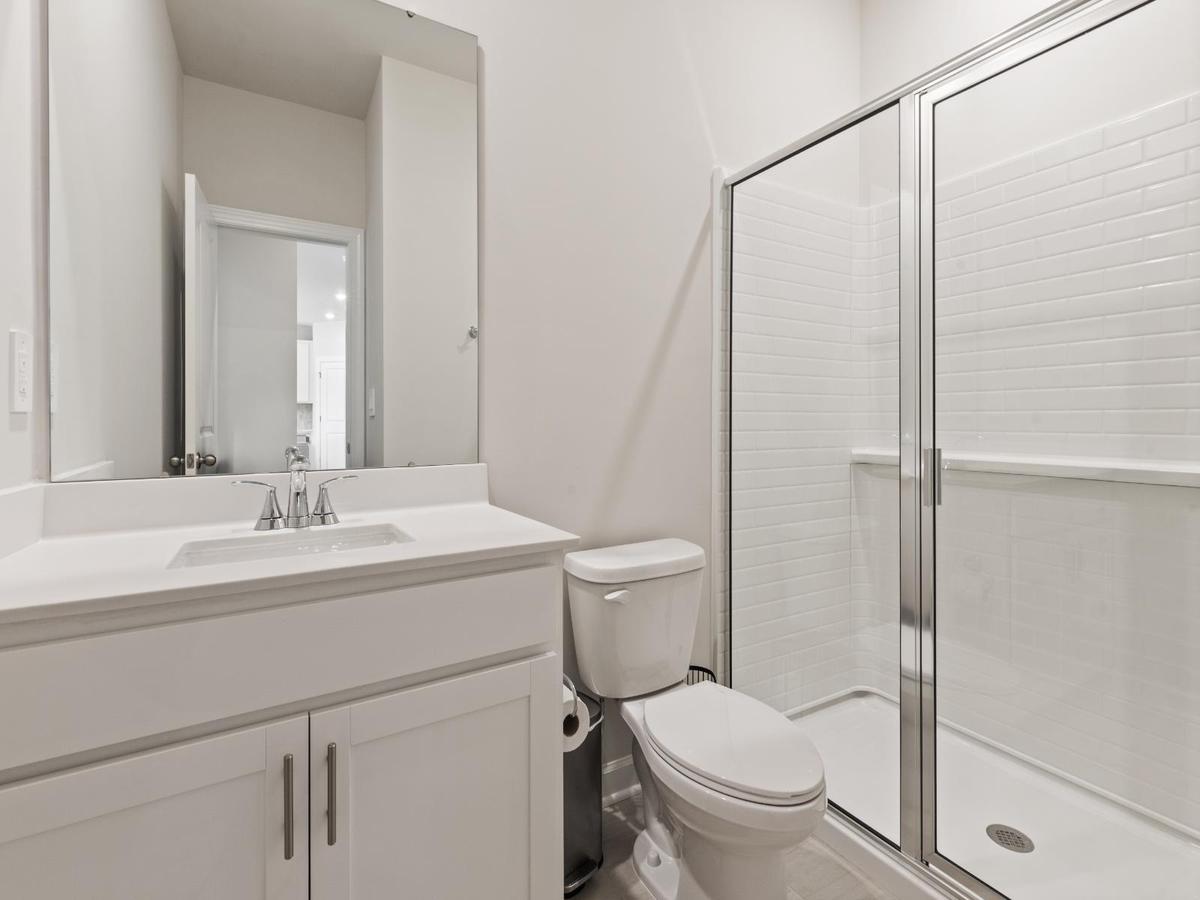 This secondary bathroom is perfect for guests and visitors.