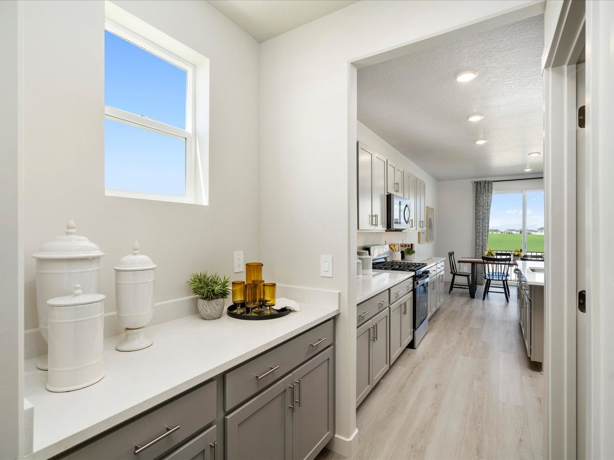 The Residence 6 floorplan interior image taken at a Meritage Homes Community in West Haven, UT.