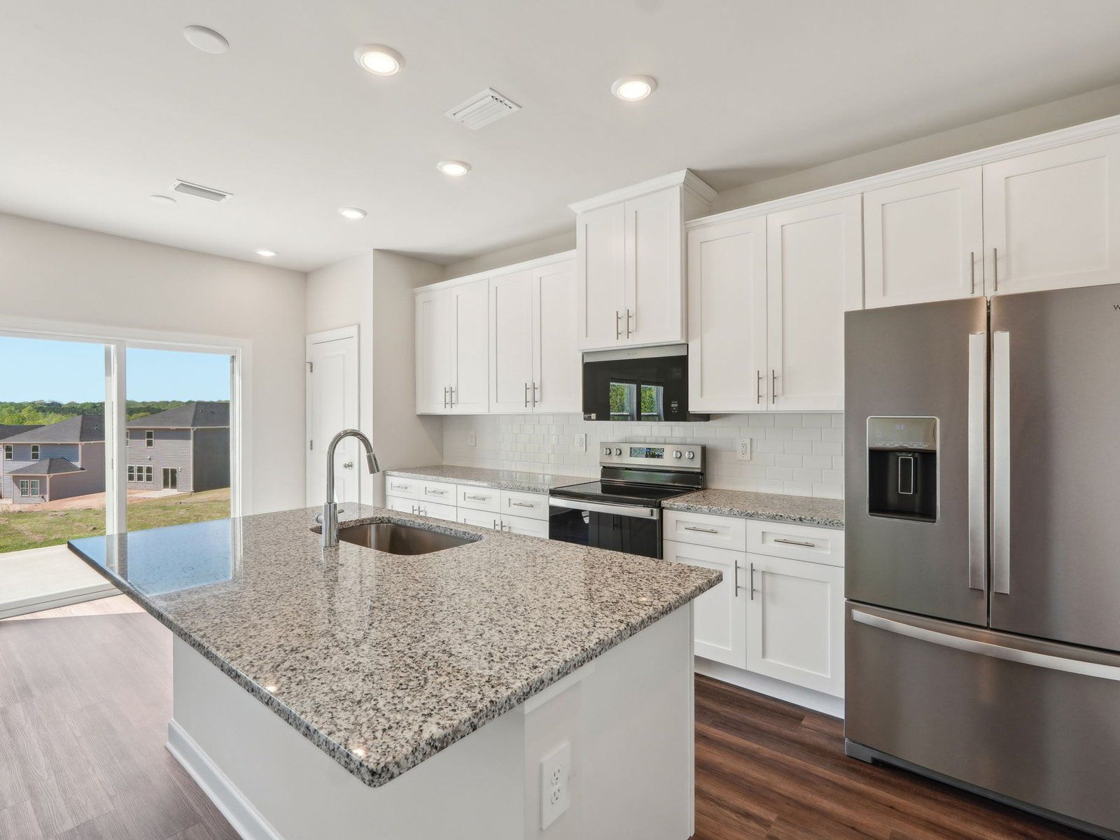 The oversized kitchen island makes meal-prep much easier.