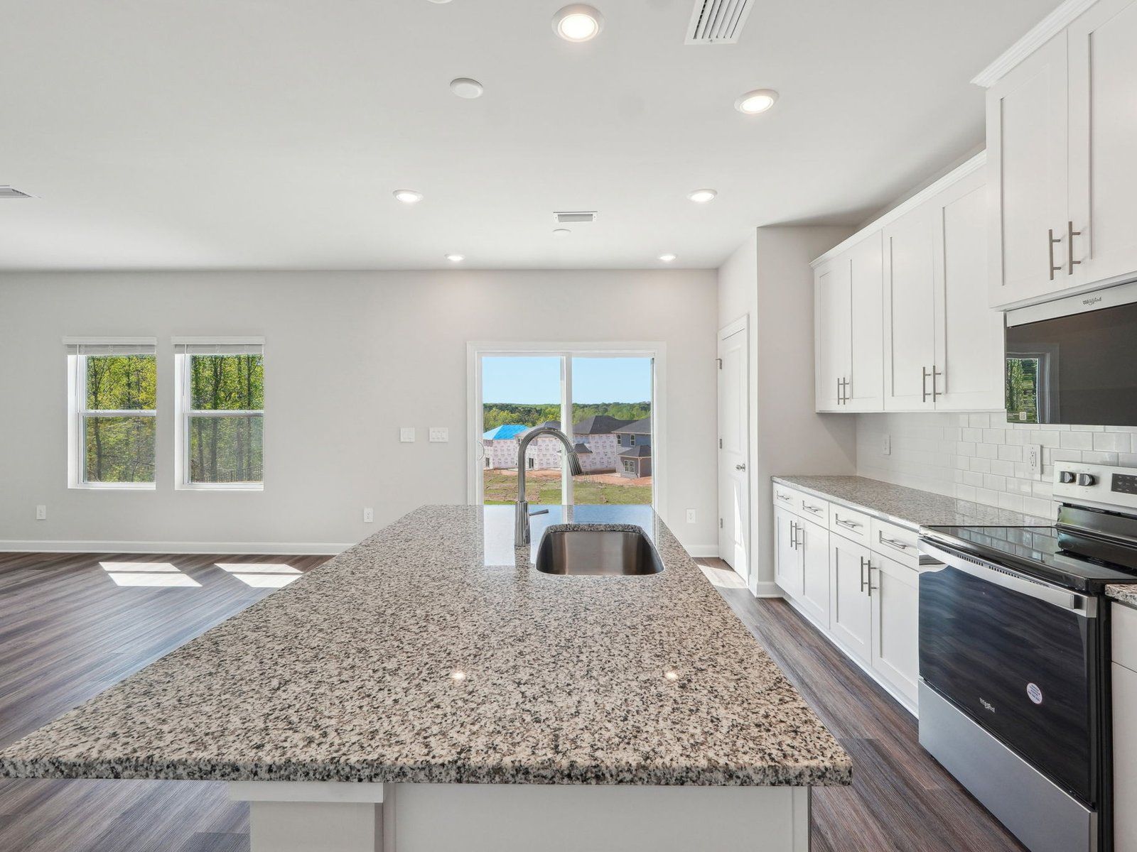 Turn the kitchen island into a bar counter for hosting guests and visitors.