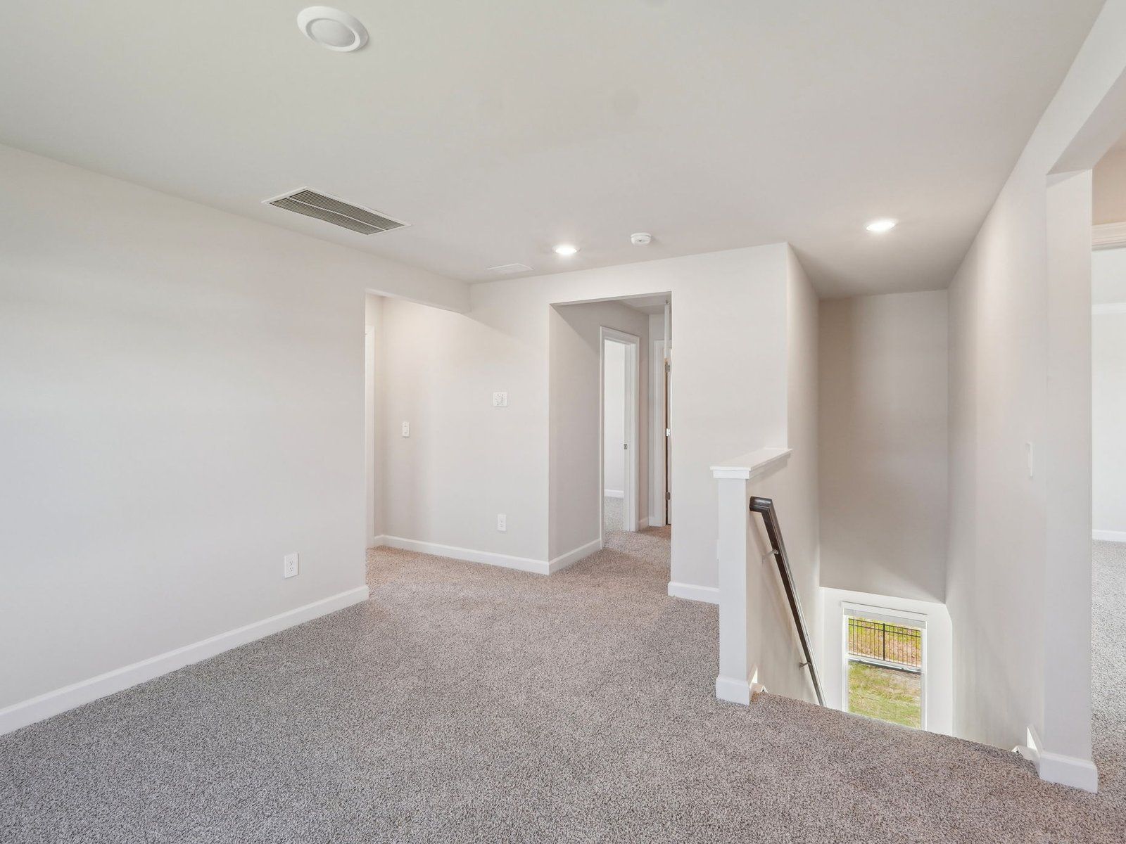 The upstairs loft conveniently connects you to each upstairs bedroom.