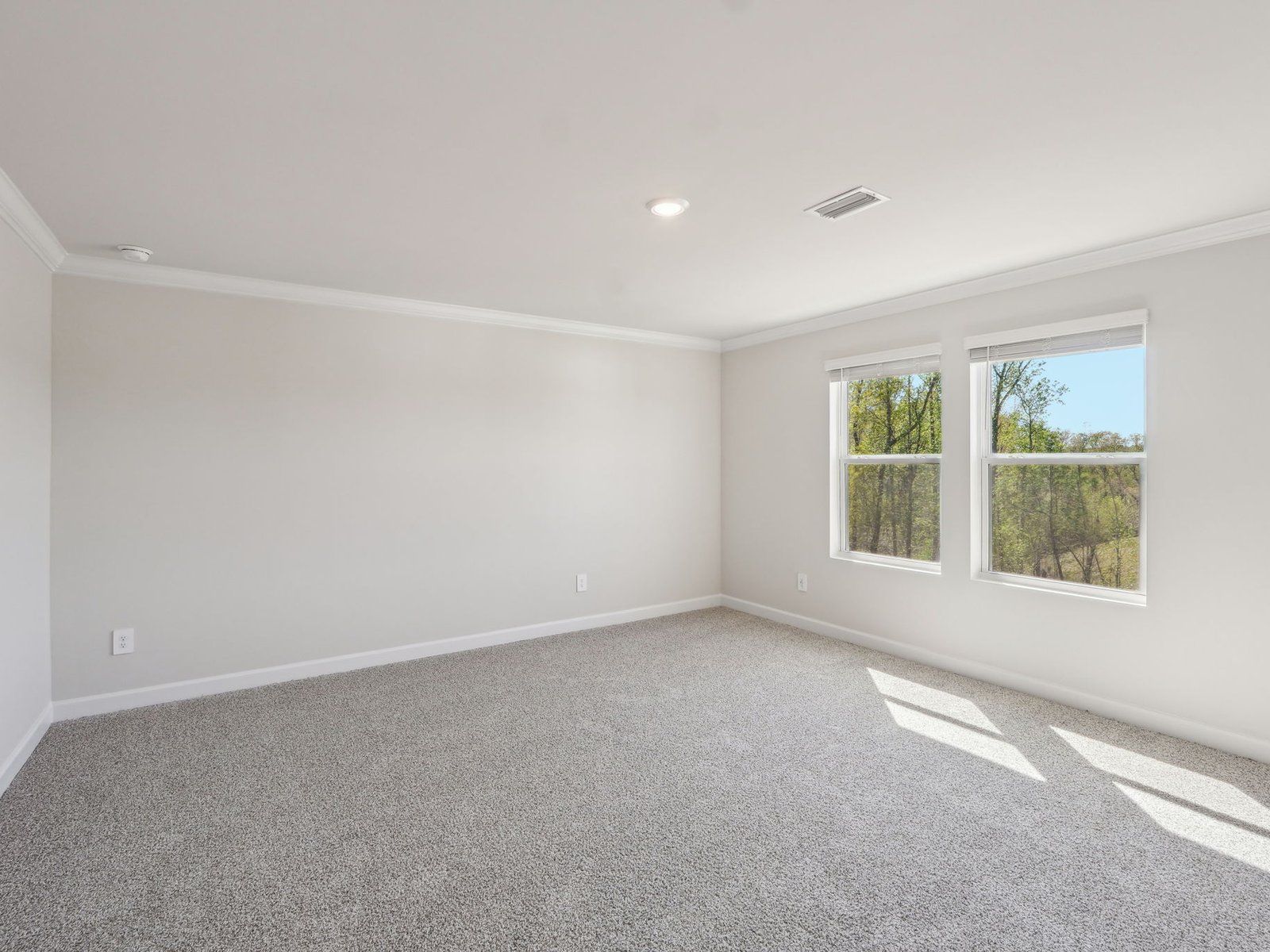 The primary bedroom is the best spot to relax and unwind.