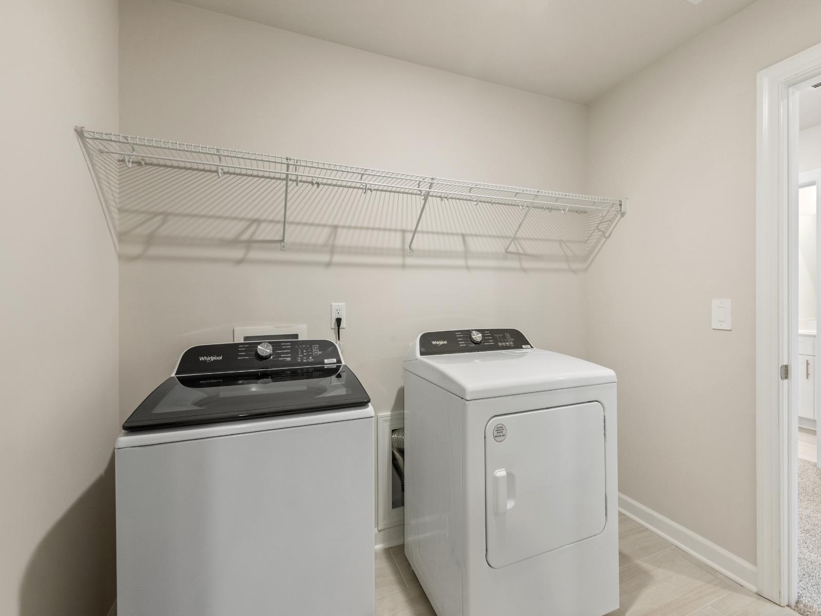 Laundry day just got easier with all the space for sorting and organizing clothes.