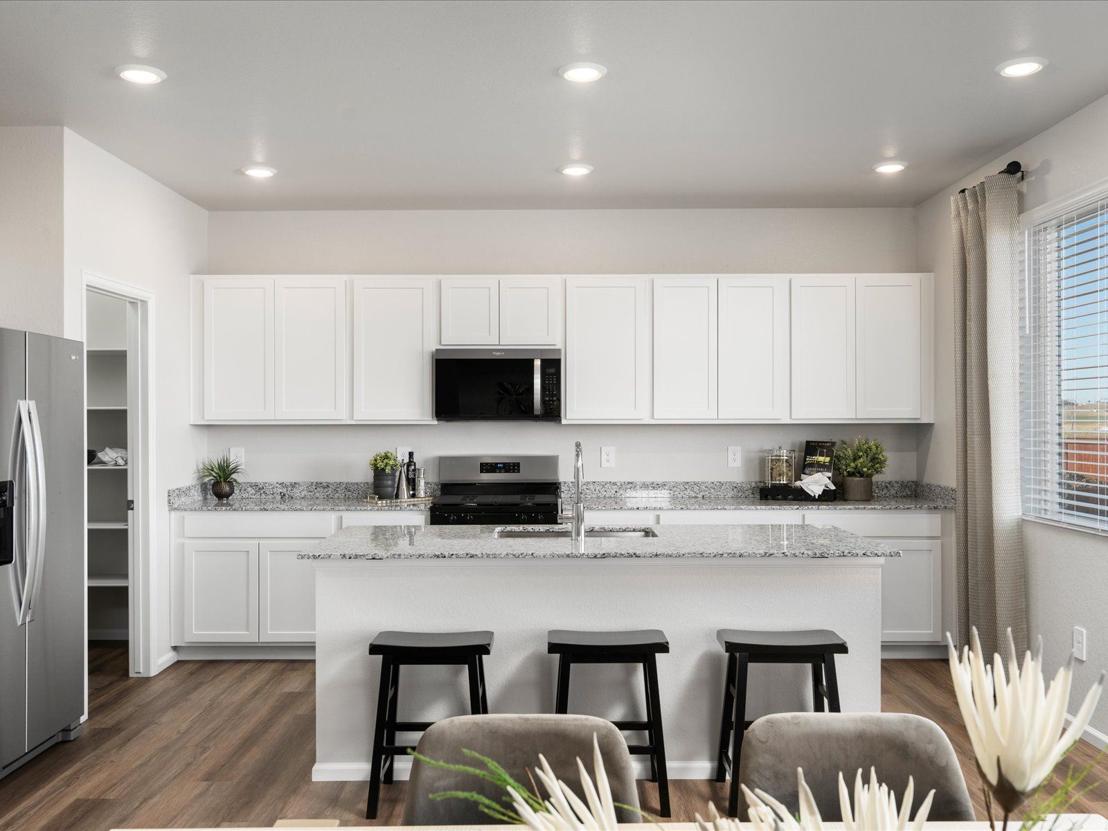 The Monarch floorplan interior image modeled at a Meritage Homes community in Johnstown, CO.