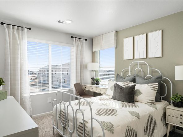 The Monarch floorplan interior image modeled at a Meritage Homes community in Johnstown, CO.
