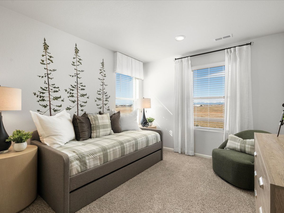 The Monarch floorplan interior image modeled at a Meritage Homes community in Johnstown, CO.