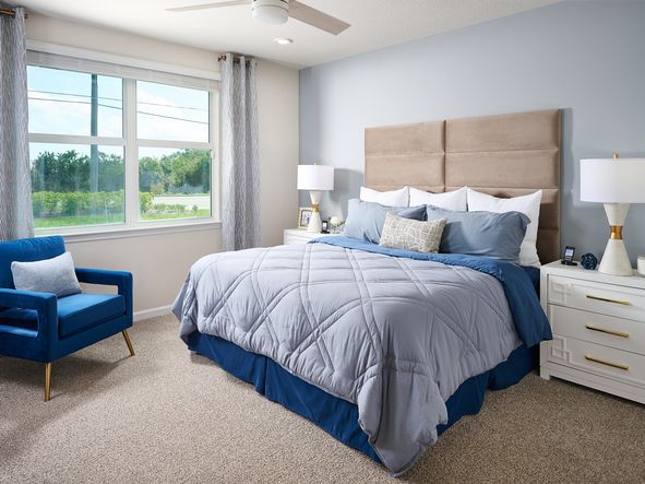 The Primary Bedroom of the Foxglove Model at Hampton Park
