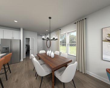 The open-concept floorplan allows for an easy flow between the kitchen and dining areas.