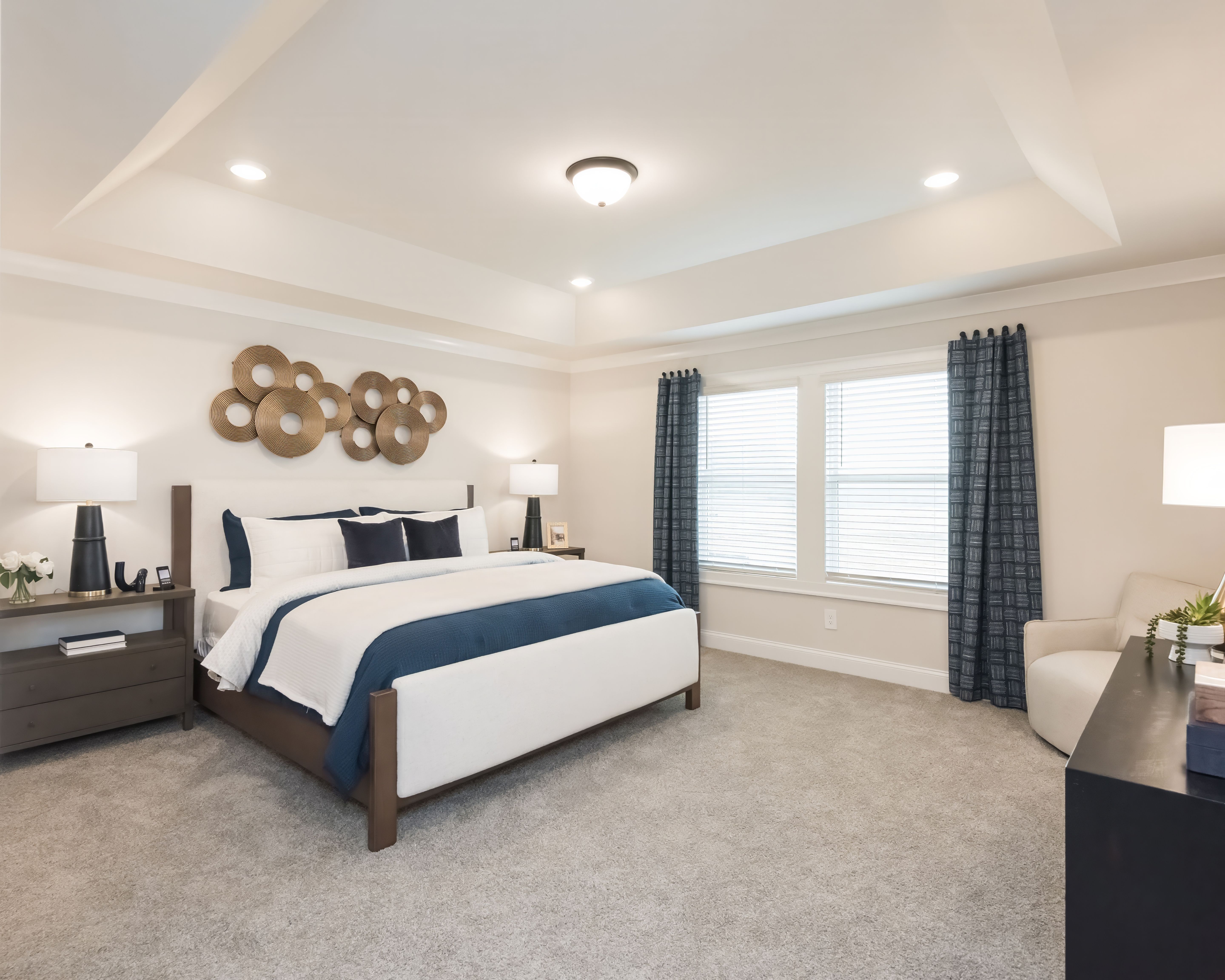 The primary suite is a private retreat to relax and unwind.