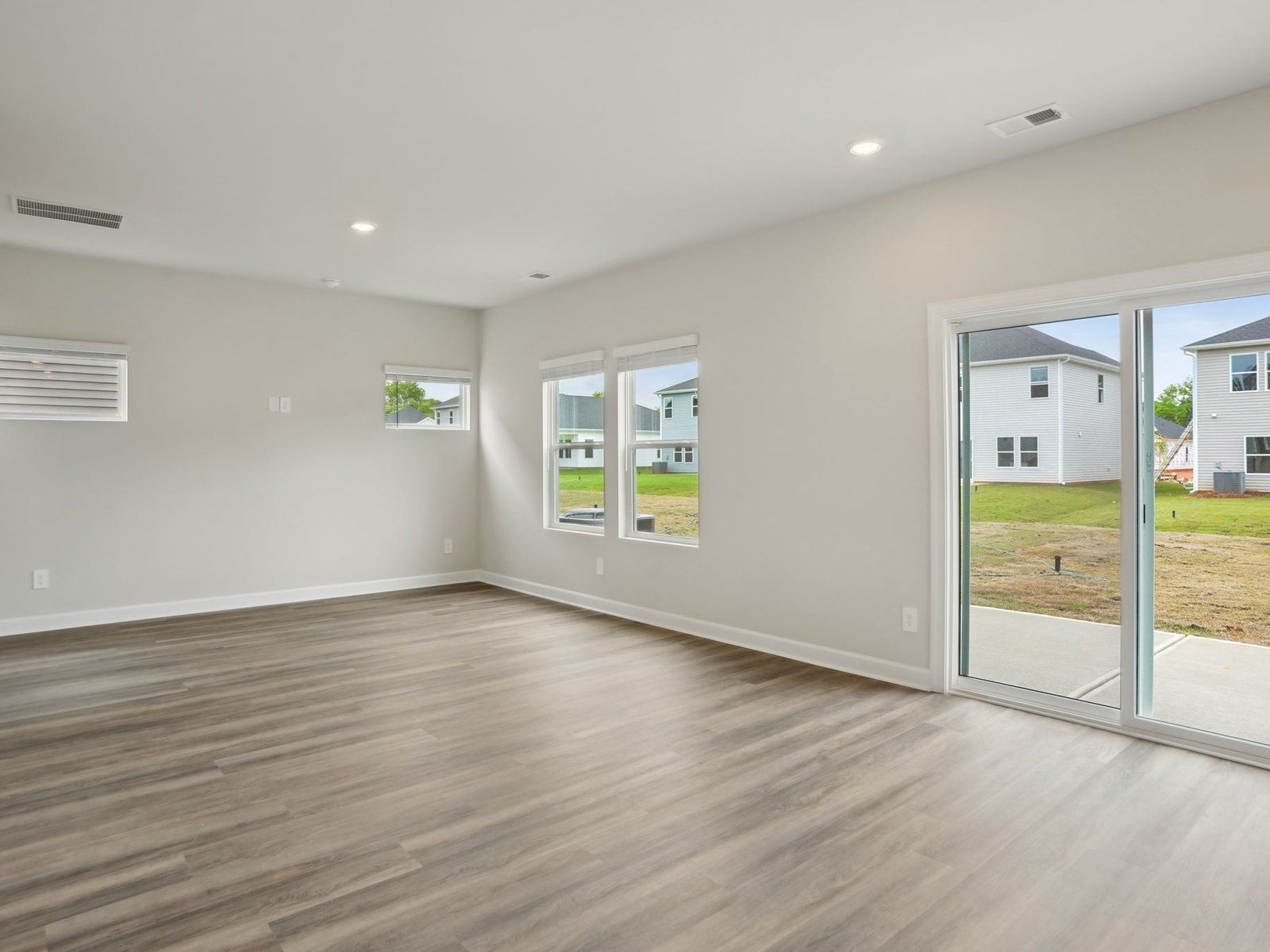 The great room conveniently leads to the outdoor back patio.