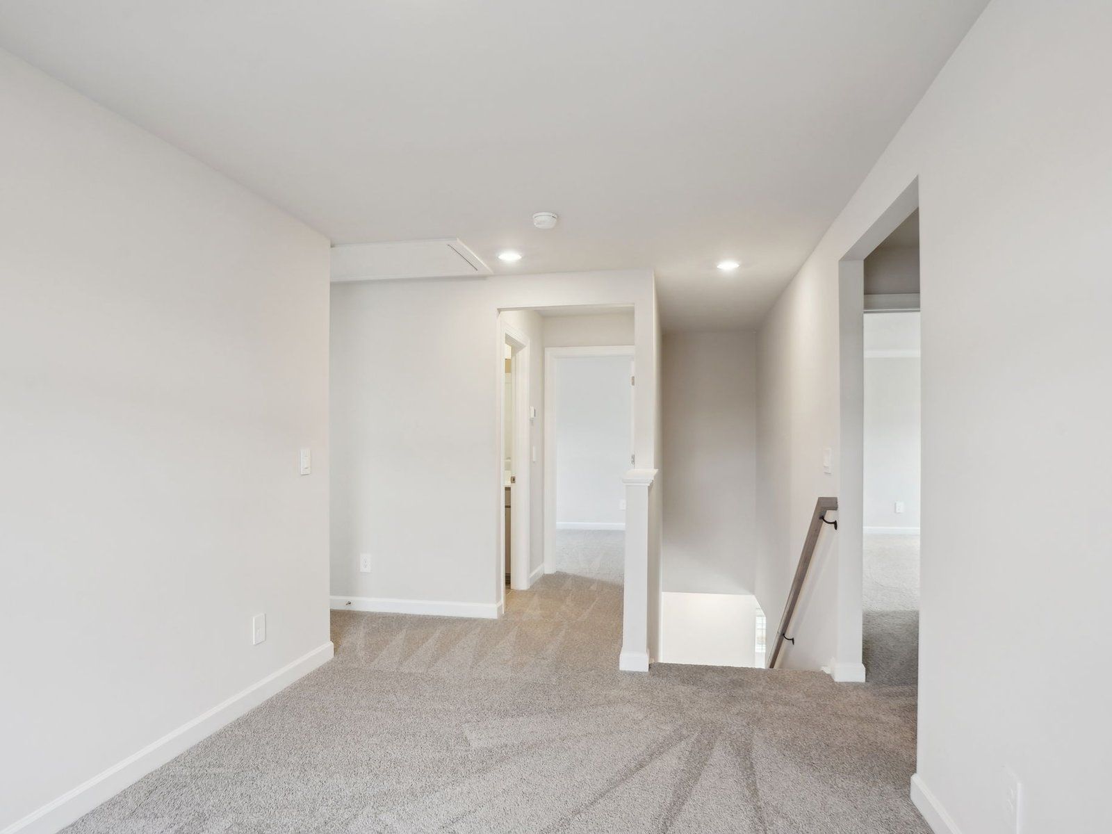 The upstairs loft conveniently leads to the Alexander's three bedrooms.