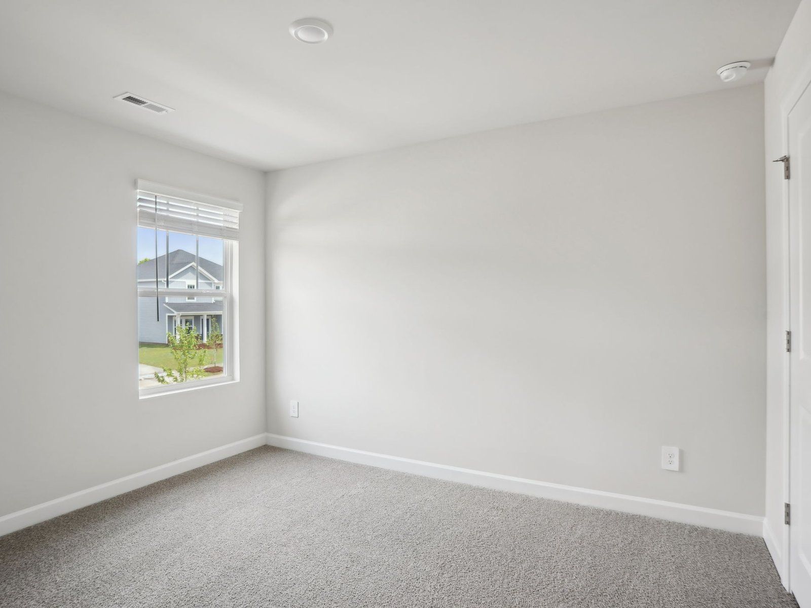 This secondary bedroom can be customized into a perfect guest room.
