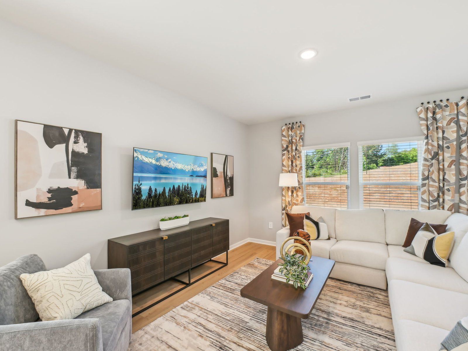 An abundance of natural light complements the spacious great room.