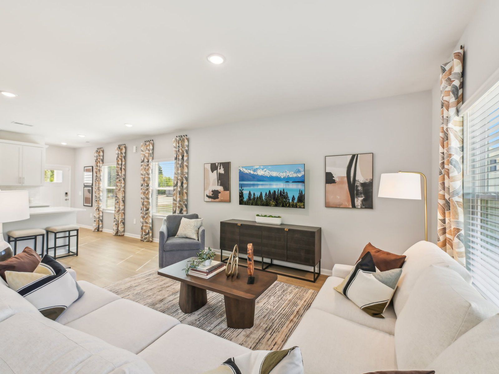 An abundance of natural light complements the spacious great room.