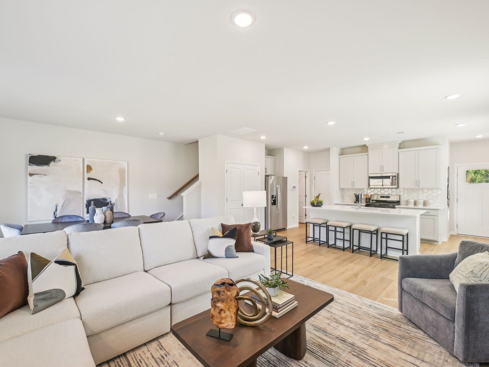 An abundance of natural light complements the spacious great room.