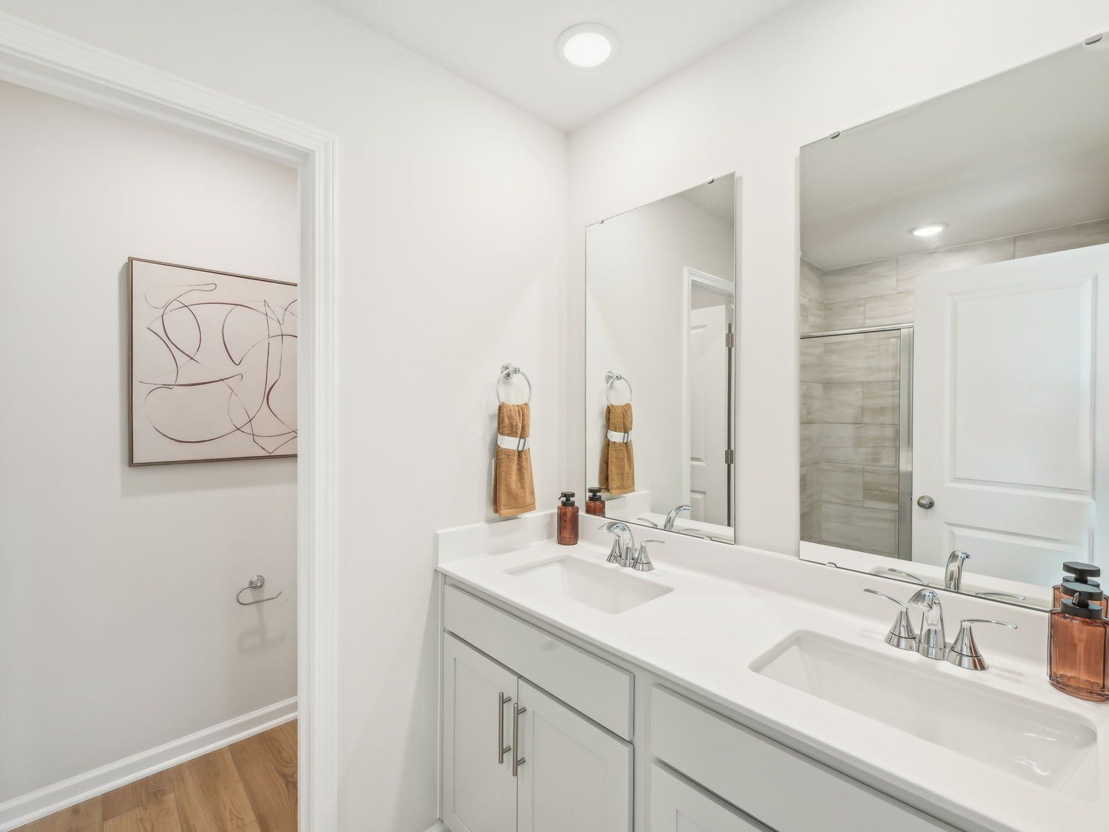The spacious primary suite features a large walk-in closet and an ensuite bath.