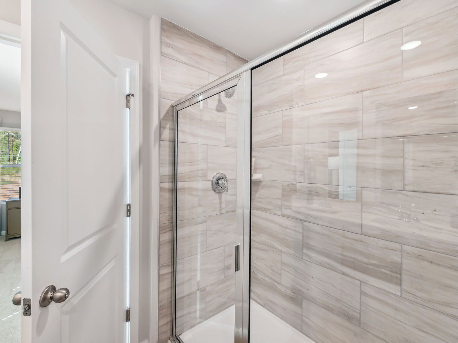 The spacious primary suite features a large walk-in closet and an ensuite bath.