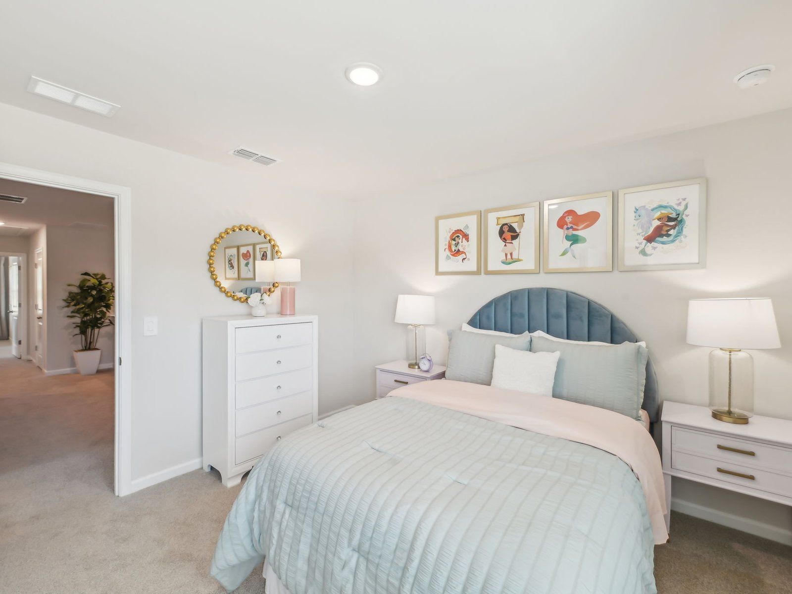 Two secondary bedrooms share a connected bathroom with dual sinks.