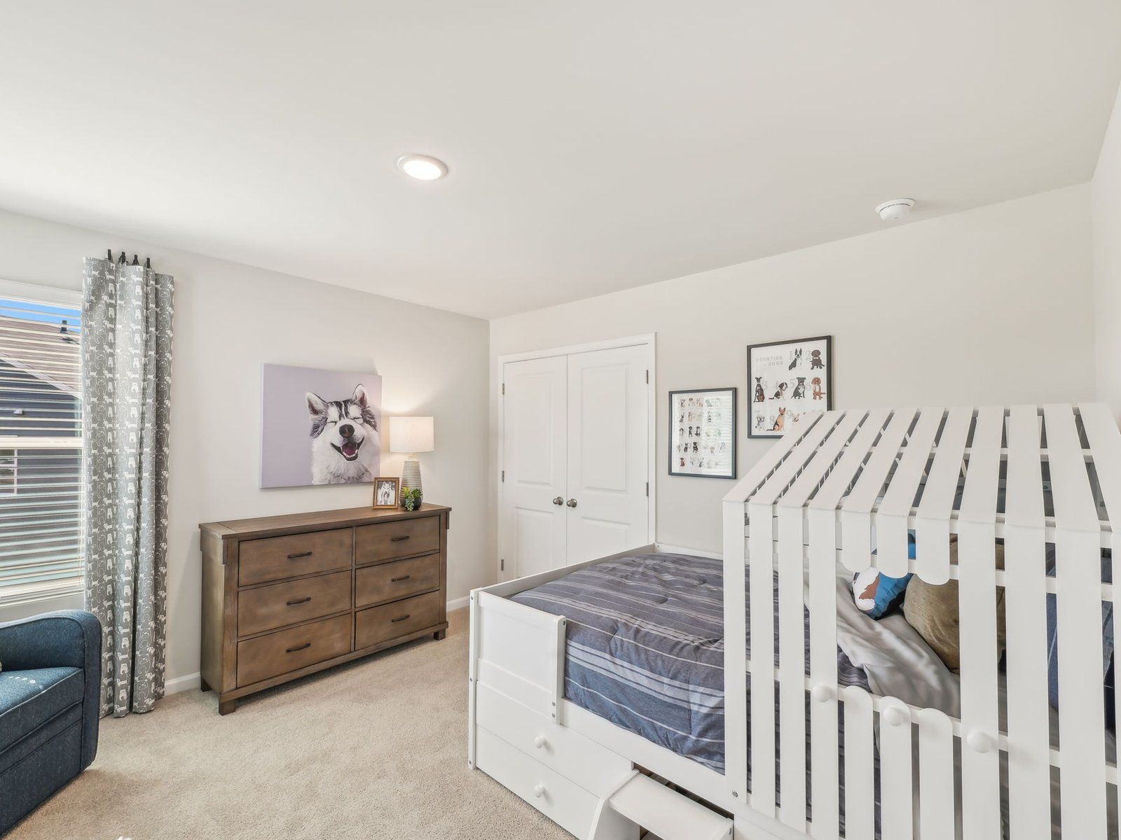 Two secondary bedrooms share a connected bathroom with dual sinks.