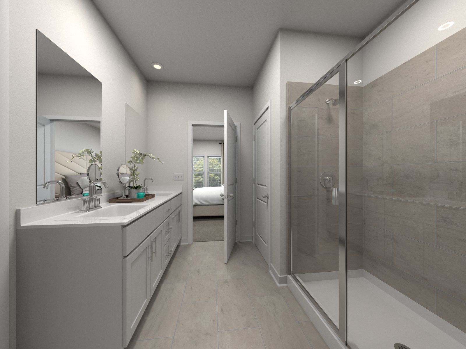 The primary bathroom offers dual vanity sinks and a walk-in shower.